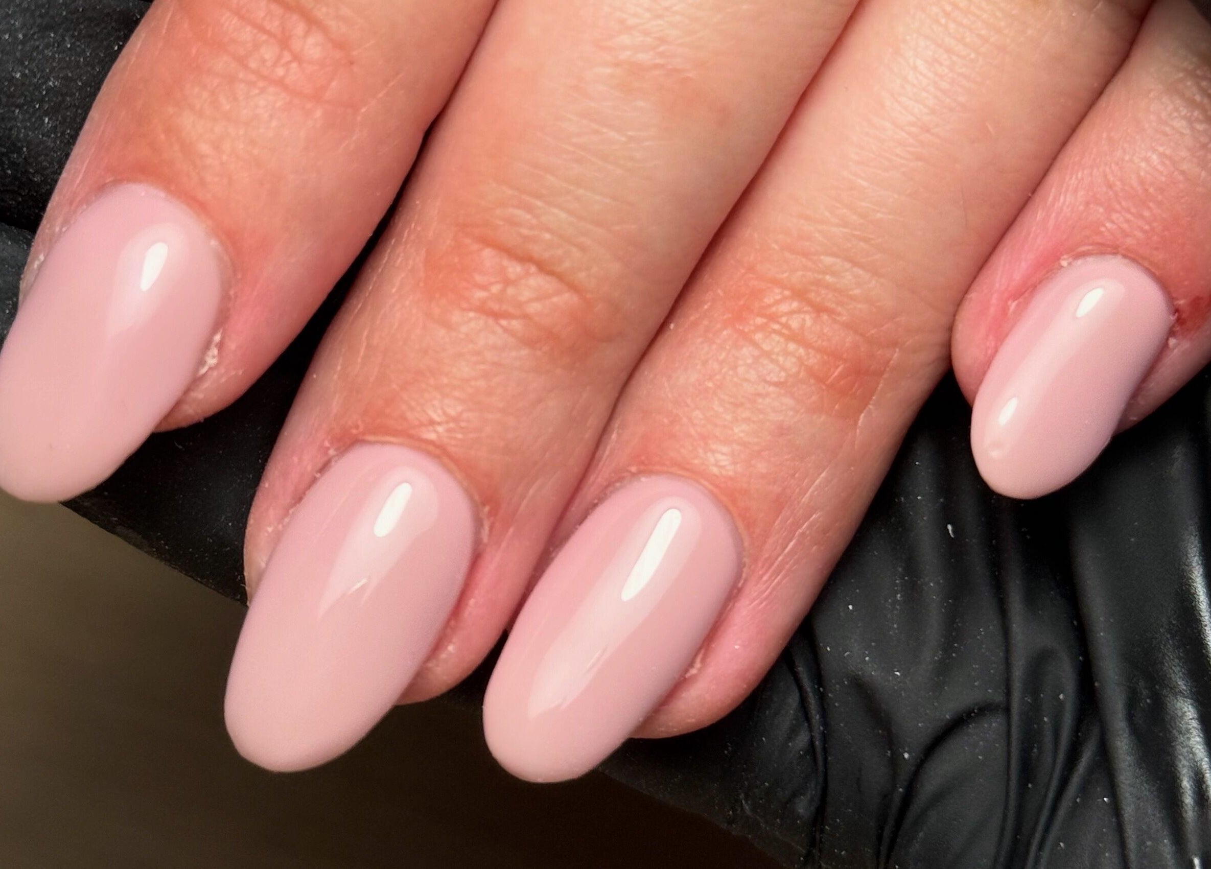 Elegant blush pink nails expertly done at CXM Nails, located in Bangor, Northern Ireland, GB.