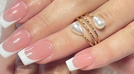 French manicure at Xio’S Nails in Greensboro, North Carolina, US, showcasing stylish nail art.