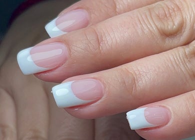 French manicure at Xio’s Nails in Greensboro, North Carolina, US showcases elegant white tips.