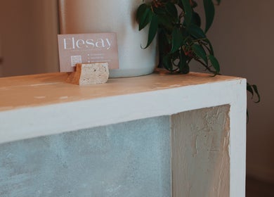 Elesay's elegant reception area in Mackay, Queensland, AU featuring a stylish business card display.