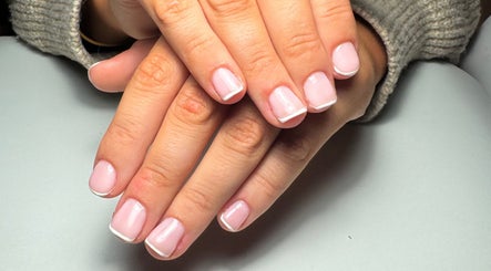 French manicure at JMCnailsalon, Yeovil, England, GB showcasing classic elegance and style.