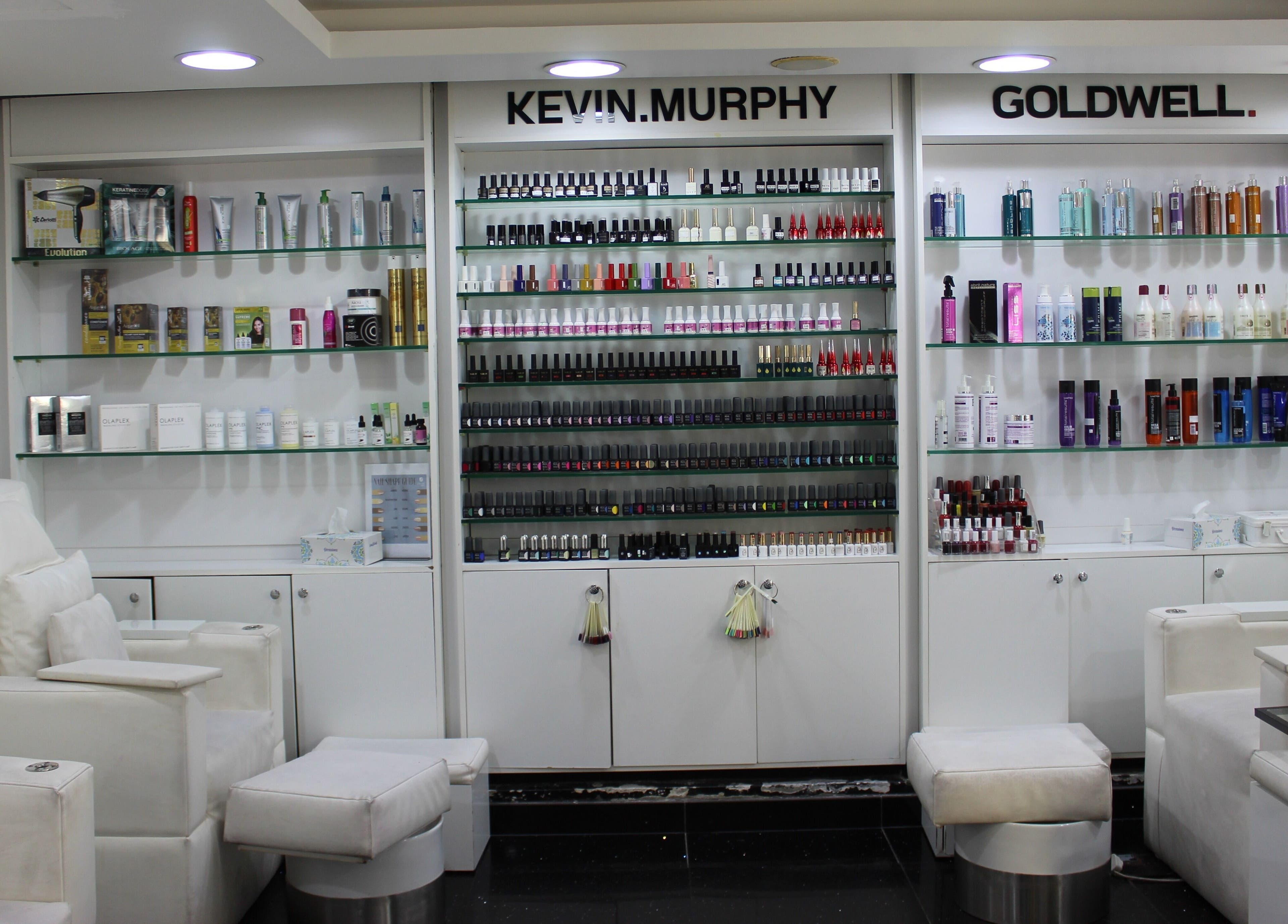 Elegant interiors featuring products at Black & White Salon, Dubai, Dubai, AE.