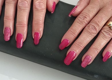 Sparkling pink manicure at Beauty by Kimberley, Dollar, Scotland, GB. Elegant nail art showcase.
