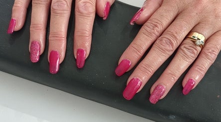 Sparkling pink manicure at Beauty by Kimberley, Dollar, Scotland, GB. Elegant nail art showcase.
