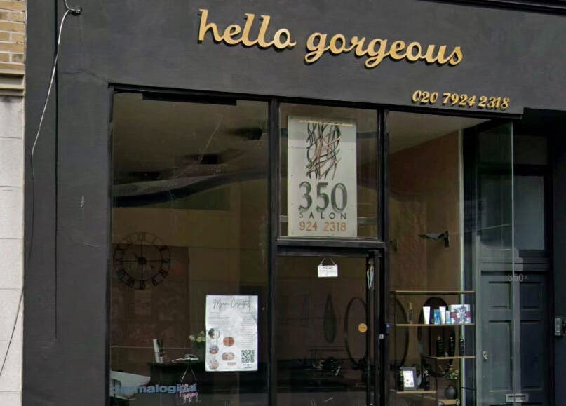 Exterior view of Hello Gorgeous Hairdressing located in London, England, GB, showcasing its elegant signage.