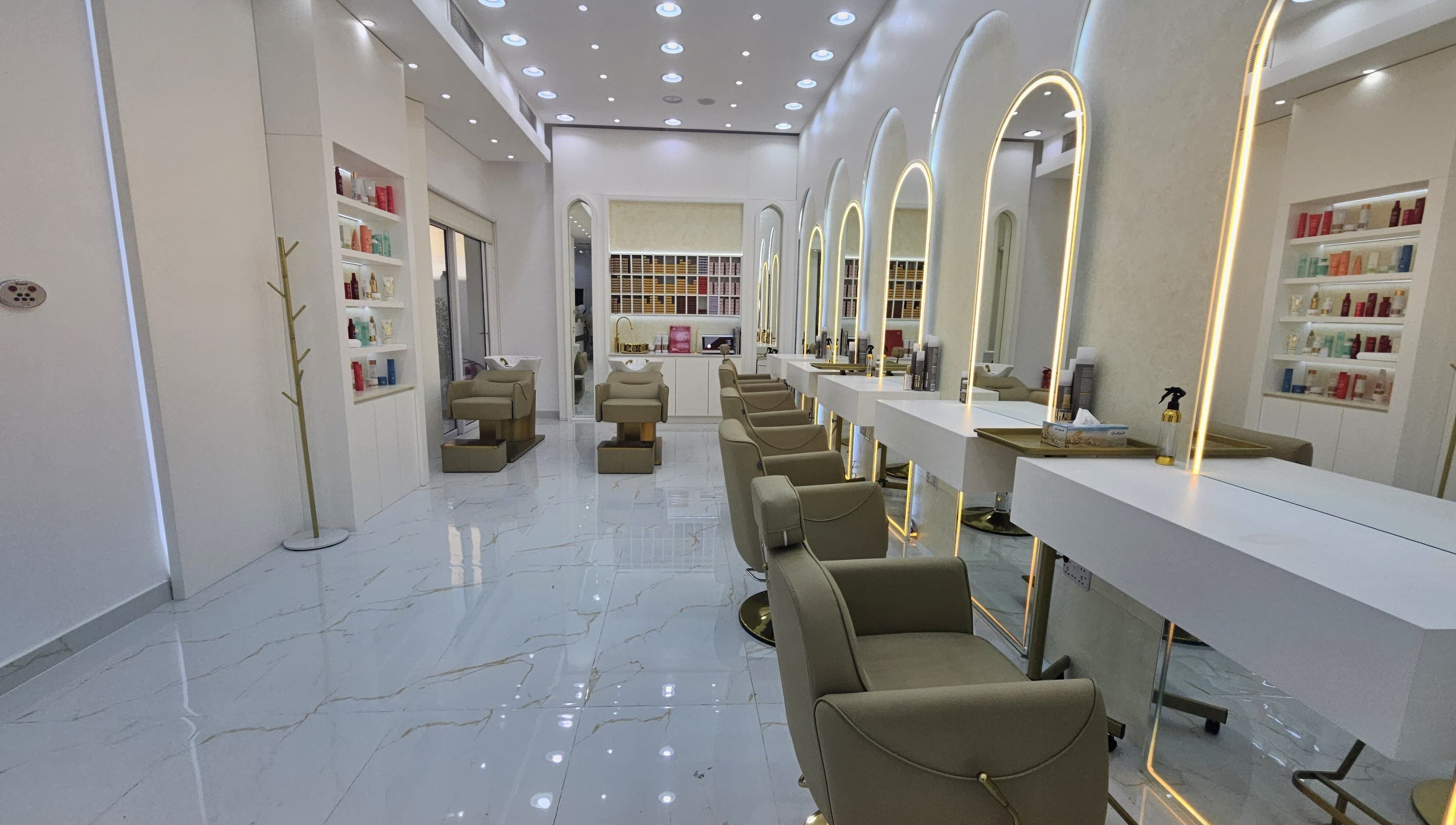 Modern salon interior with chic chairs at Azalea Beauty Center, Sharjah, Sharjah, AE.