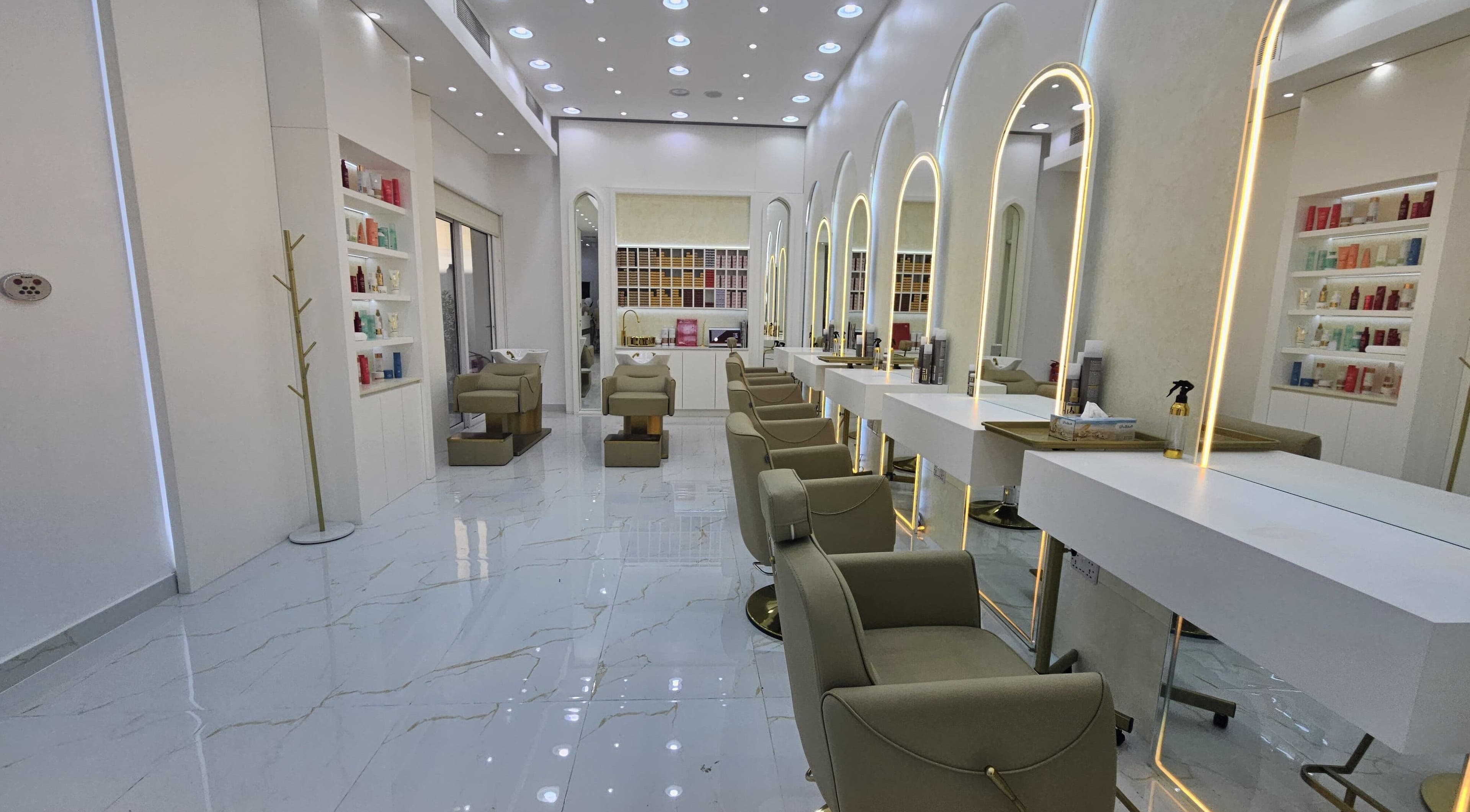 Modern salon interior with chic chairs at Azalea Beauty Center, Sharjah, Sharjah, AE.