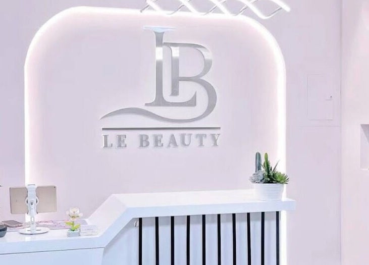 Le Beauty's stylish reception desk in New York, New York, US, featuring modern decor and sleek design.
