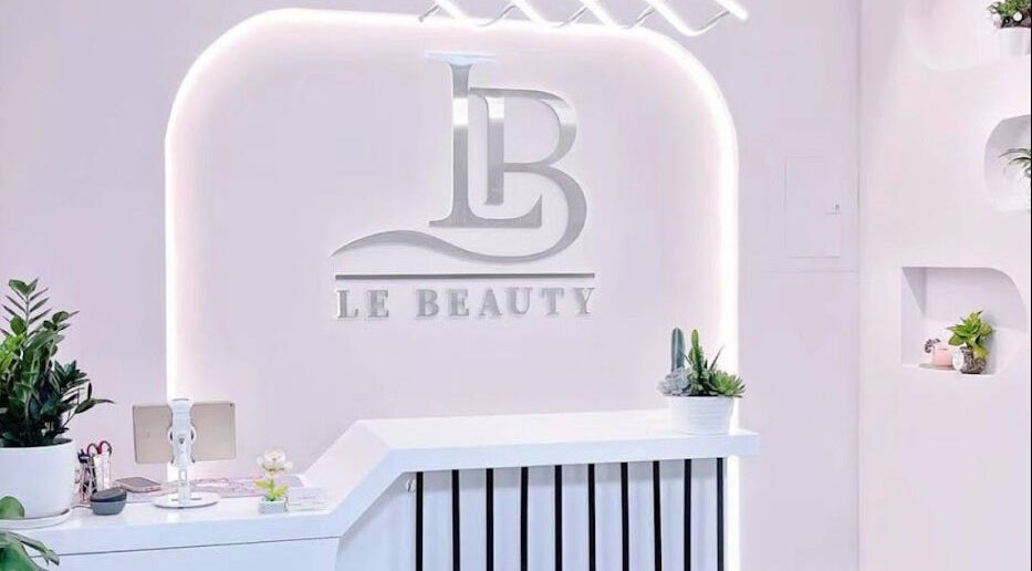 Le Beauty's stylish reception desk in New York, New York, US, featuring modern decor and sleek design.