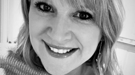 Smiling person at Stephanie Smith Hair, Aylesbury, England, GB showcasing stylish beauty.