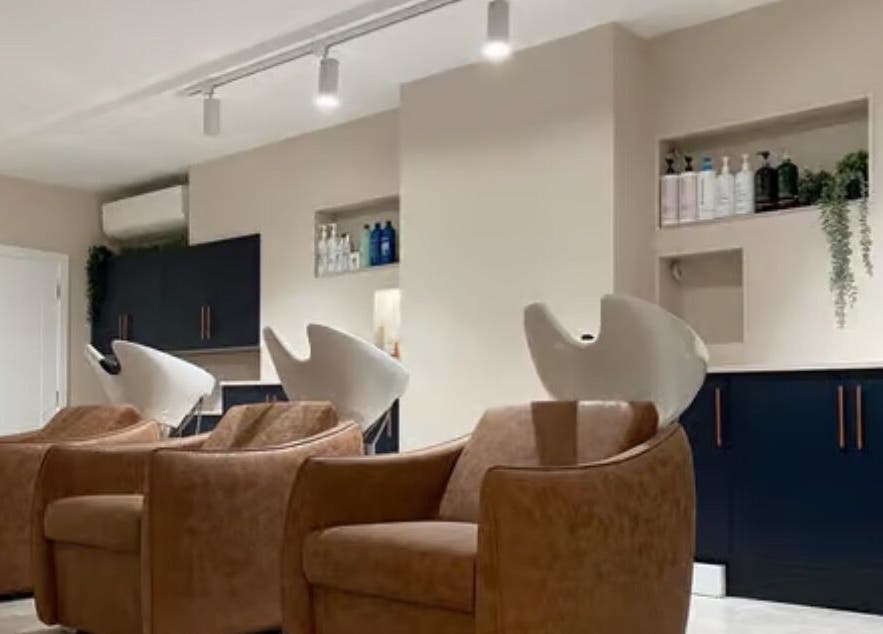 Wash stations at Stephanie Smith Hair, Aylesbury, England, GB, offering a relaxing salon experience.