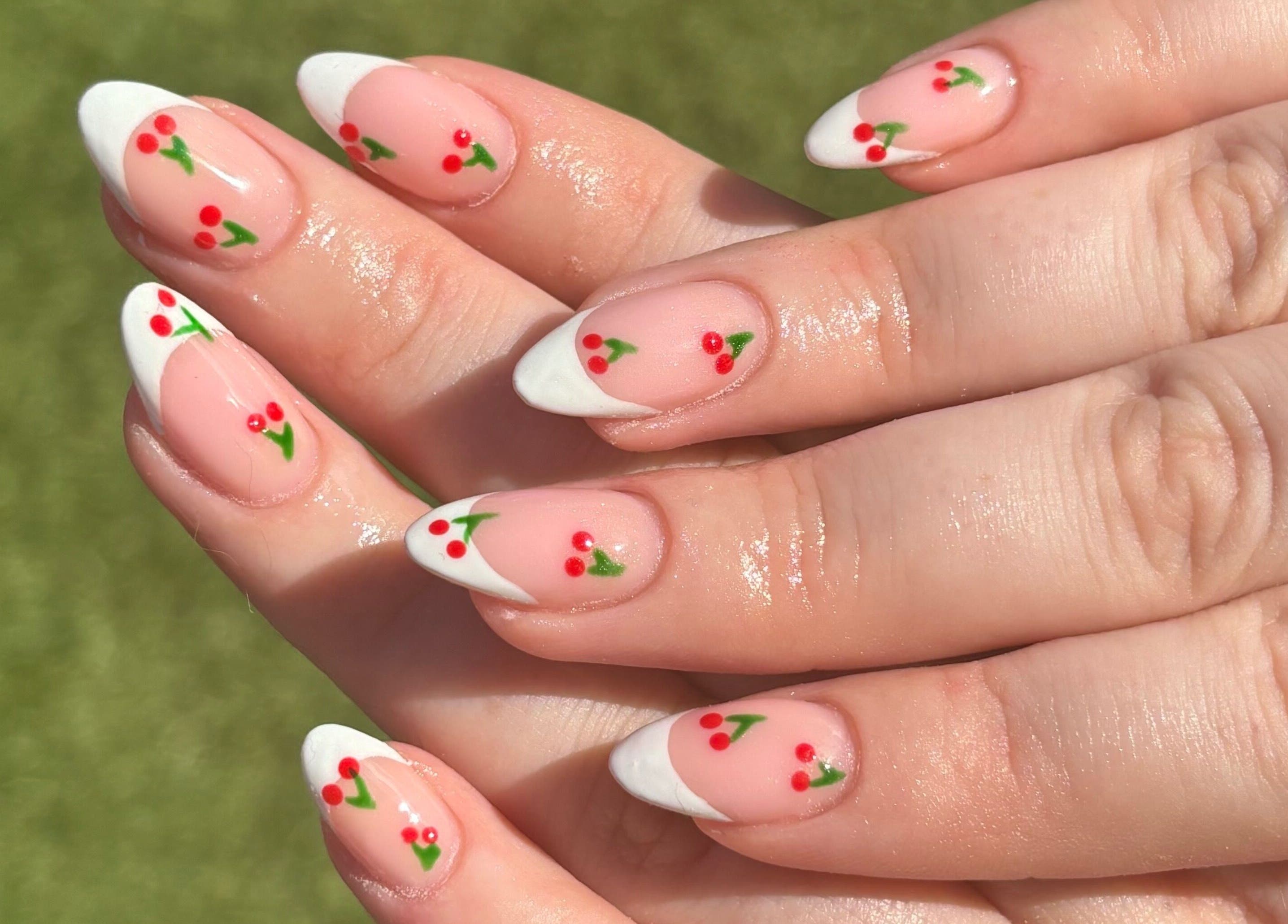 Elegant cherry nail art at Nails by Chloe, Glasgow, Scotland, GB. Perfect blend of style and creativity.