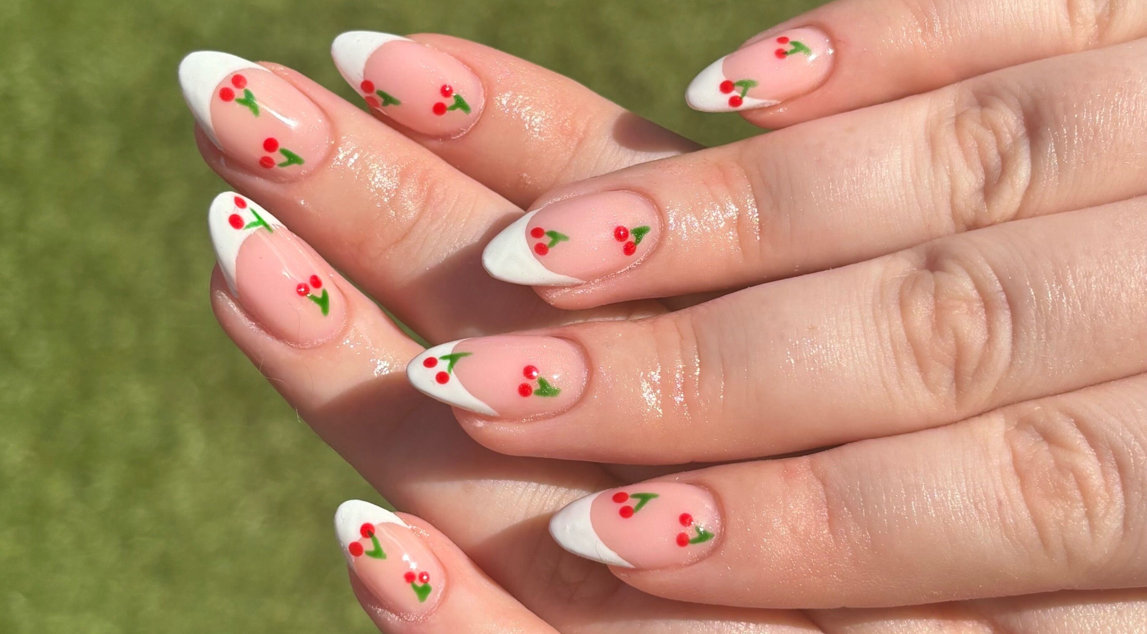 Elegant cherry nail art at Nails by Chloe, Glasgow, Scotland, GB. Perfect blend of style and creativity.