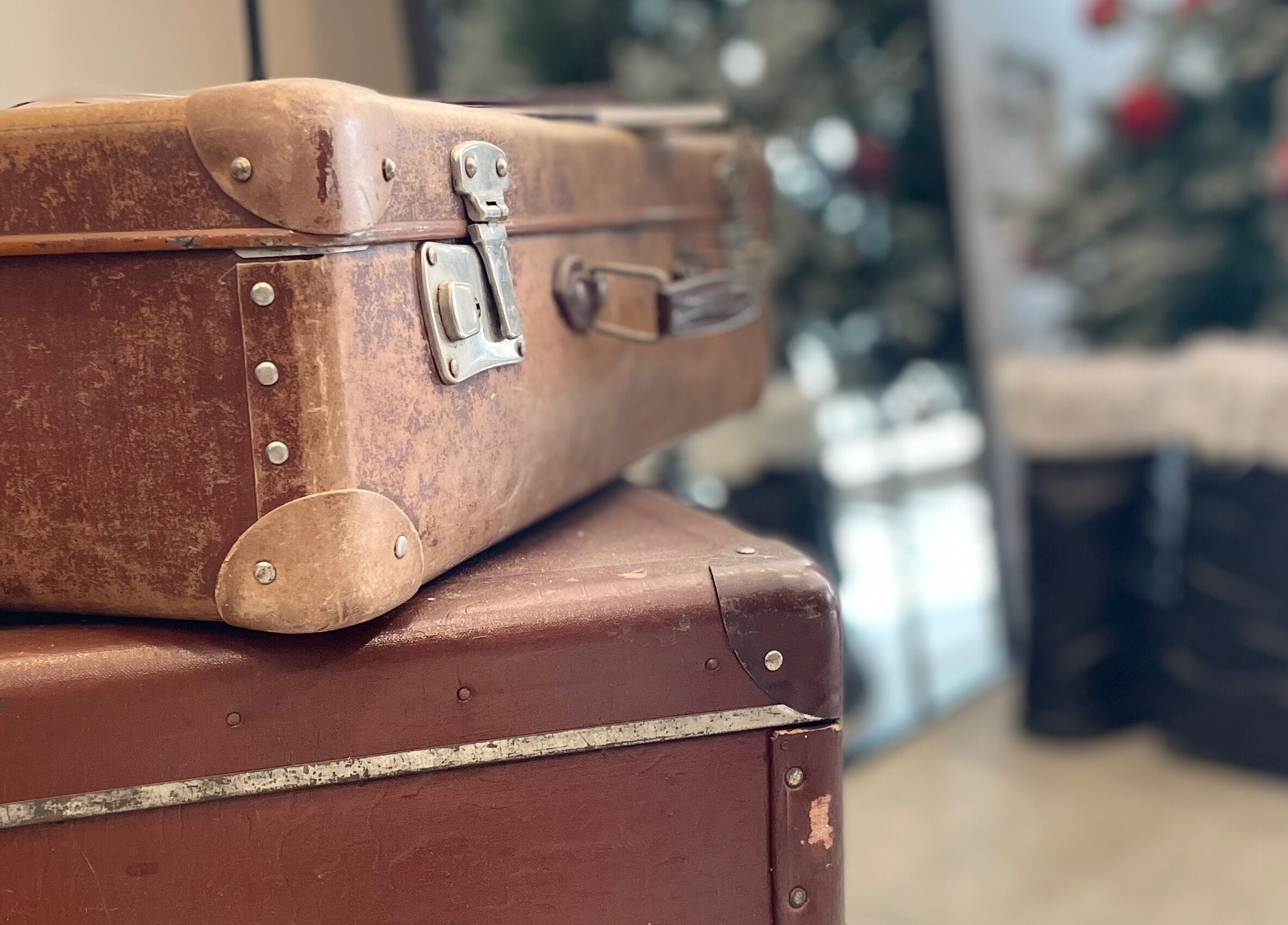 Vintage luggage at Diva Beauty Lounge, Tas-sliema, MT, adding rustic charm to the ambiance.