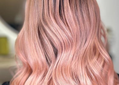 Rose gold hair styled in soft waves at Lily Hair Studio, Barcelona, Catalunya, ES.