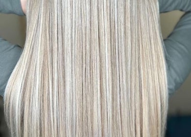 Smooth, straightened blonde hair at Lily Hair Studio, Barcelona, Catalunya, ES.