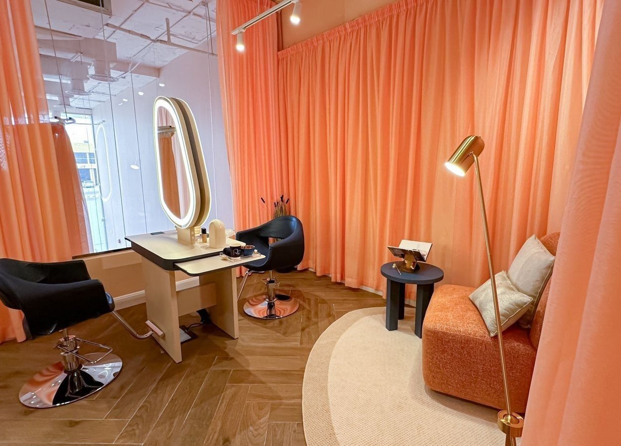 Elegant beauty station with coral accents at Re Beauty Space, Riyadh, Riyadh Province, SA.