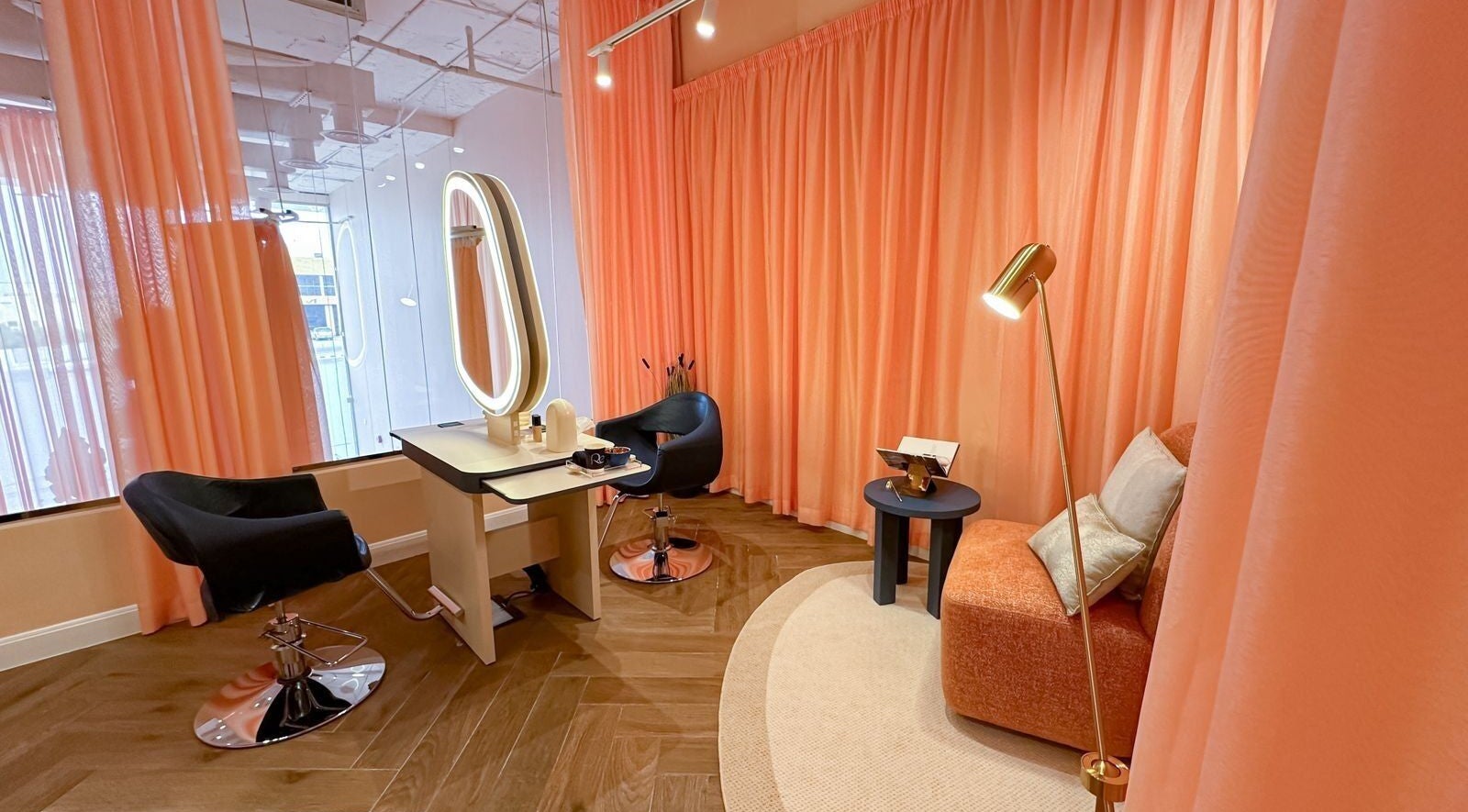 Elegant beauty station with coral accents at Re Beauty Space, Riyadh, Riyadh Province, SA.