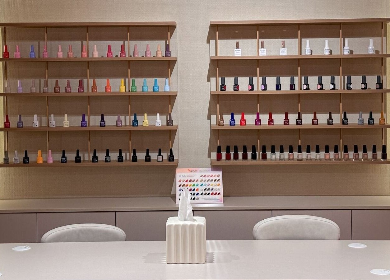 Nail polish display at Re Beauty Space, Riyadh, Riyadh Province, SA, showcasing a variety of vibrant colors.