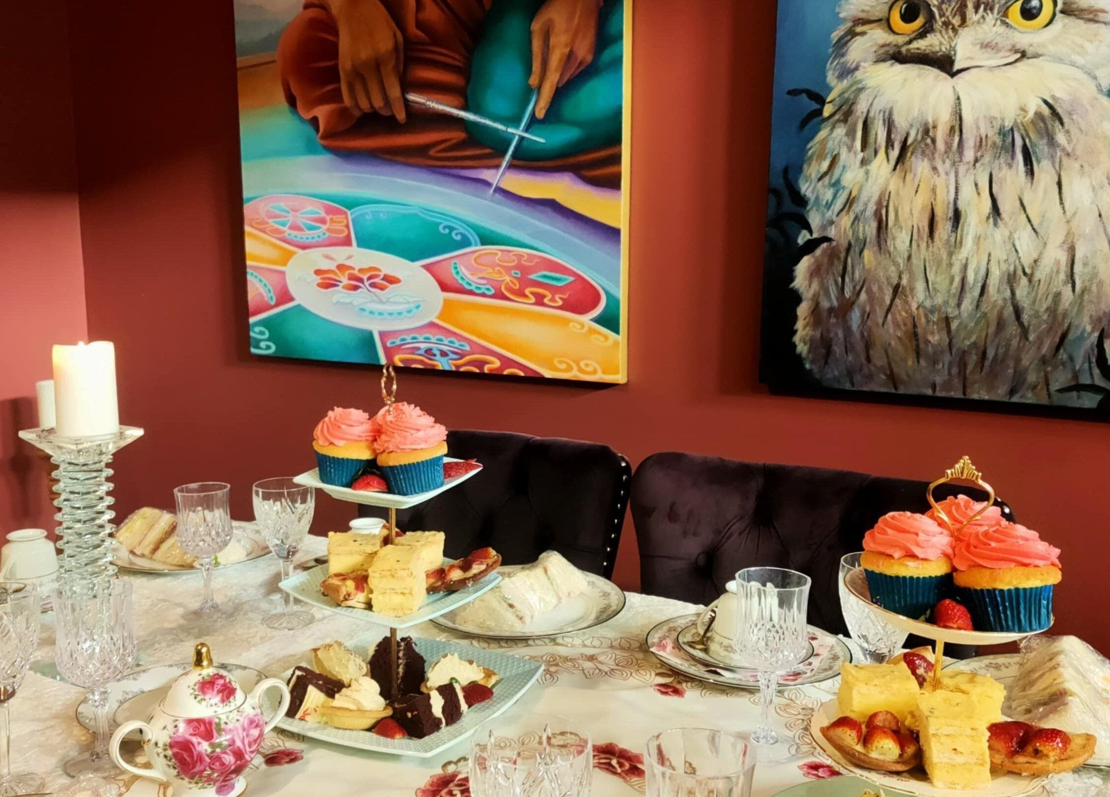 High tea setting at Blissage Day Spa Sanctuary, Tamborine Mountain, Queensland, AU with art and treats.