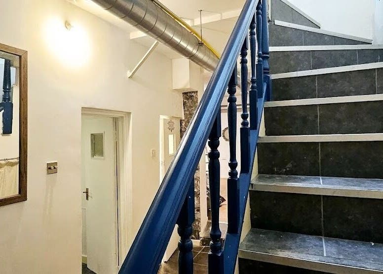 Elegant stairway interior at Mong Kon Thai Massage & Spa London, London, England, GB.