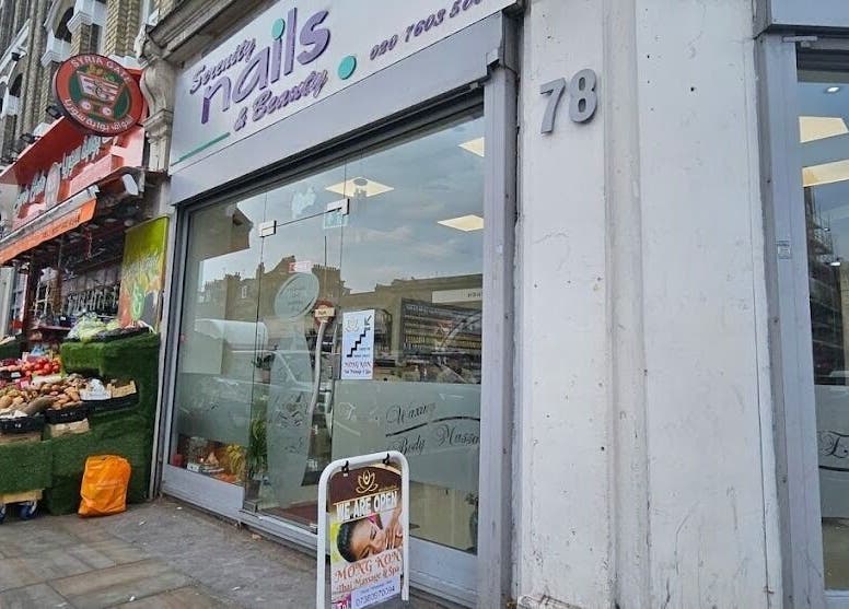 Street view of Mong Kon Thai Massage & Spa London in London, England, GB from sidewalk perspective.