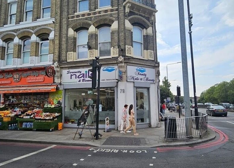 Street view of Mong Kon Thai Massage & Spa London, situated in a historic building in London, England, GB.