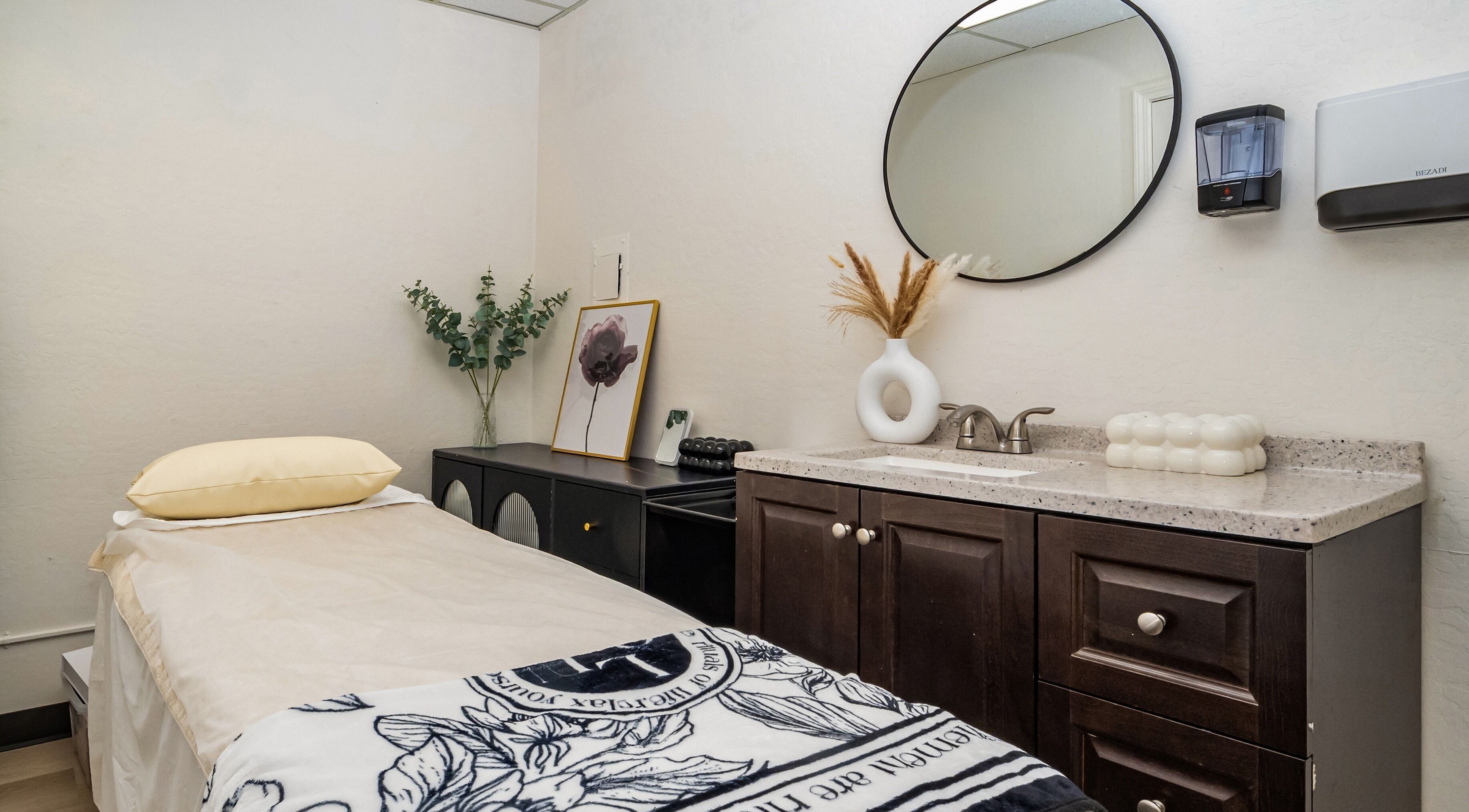 Relaxing treatment room at UM Beauty Studio in San Jose, California, US, featuring a cozy massage table.