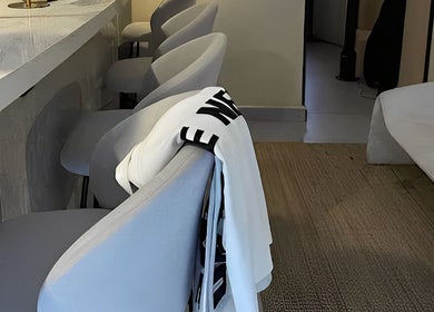 Elegant seating at Bo Nail Bar in Ciudad De México, MX, showcasing modern style and comfort.