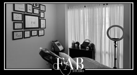 Relaxing treatment room at FAB Studio, Neerabup, Western Australia, AU, featuring elegant decor and soft lighting.