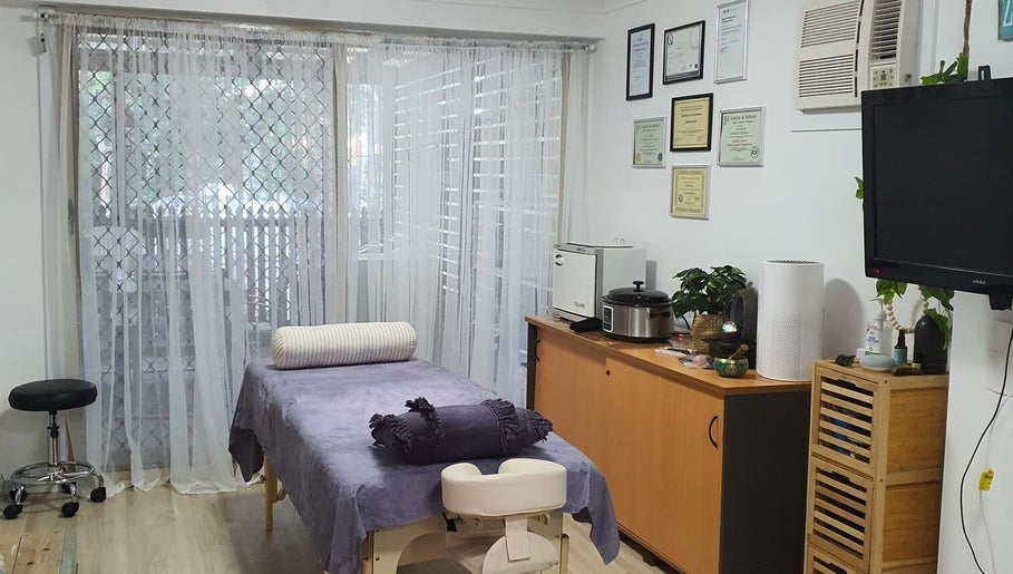Peaceful therapy room at Mind & Body Wellness Solutions, Narangba, Queensland, AU with massage table and decor.