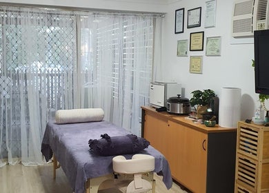 Peaceful therapy room at Mind & Body Wellness Solutions, Narangba, Queensland, AU with massage table and decor.