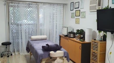 Peaceful therapy room at Mind & Body Wellness Solutions, Narangba, Queensland, AU with massage table and decor.
