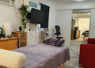 Relaxing massage room at Mind & Body Wellness Solutions in Narangba, Queensland, AU with calming decor.