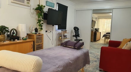 Relaxing massage room at Mind & Body Wellness Solutions in Narangba, Queensland, AU with calming decor.