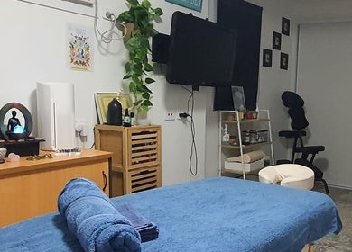 Relaxing massage room at Mind & Body Wellness Solutions in Narangba, Queensland, AU. Serene setup with soothing decor.