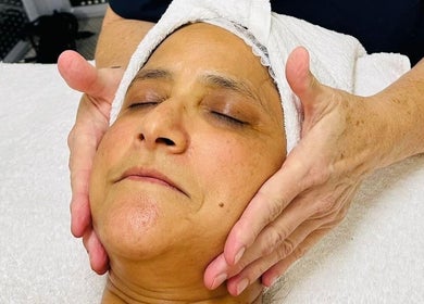 Facial massage at Mind & Body Wellness Solutions in Narangba, Queensland, AU, promoting relaxation and skincare.