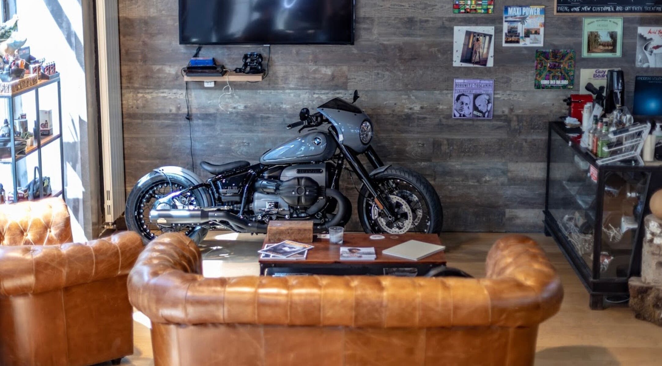 Stylish motorcycle in leather lounge at Men's Club for Good Times, Genève, Genève, CH.