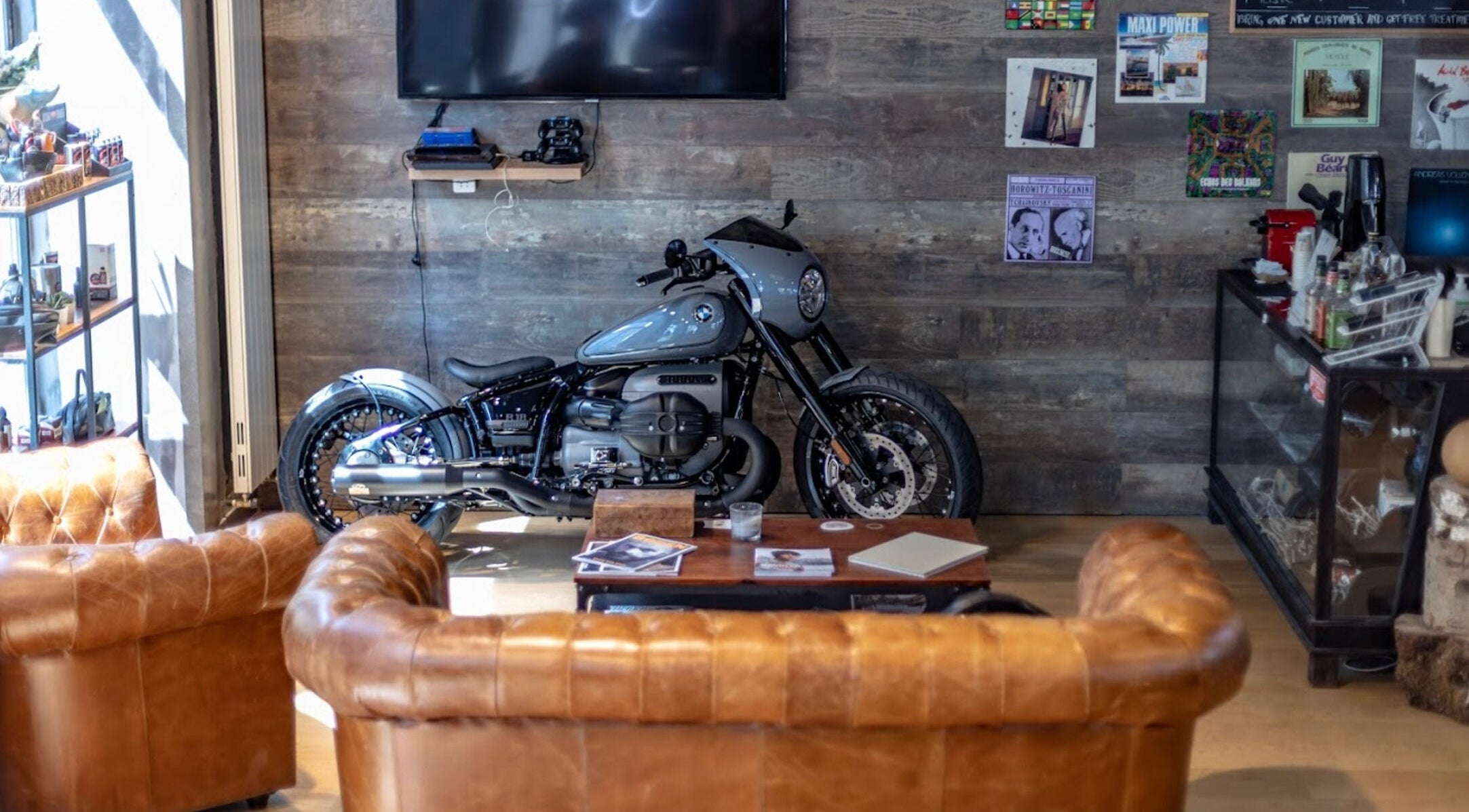 Stylish motorcycle in leather lounge at Men's Club for Good Times, Genève, Genève, CH.