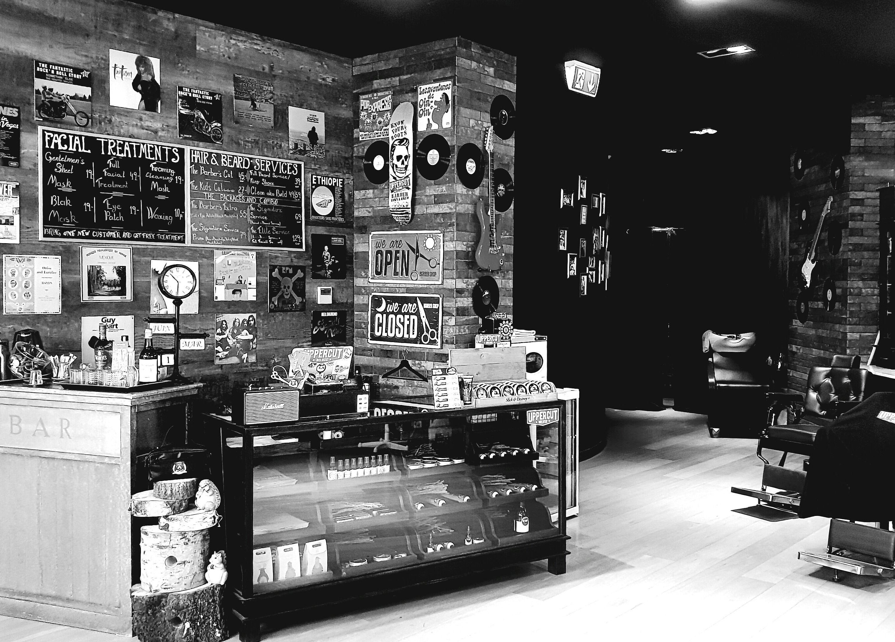 Vintage barbershop at Men's Club for Good Times, Genève, Genève, CH featuring classic decor and grooming stations.