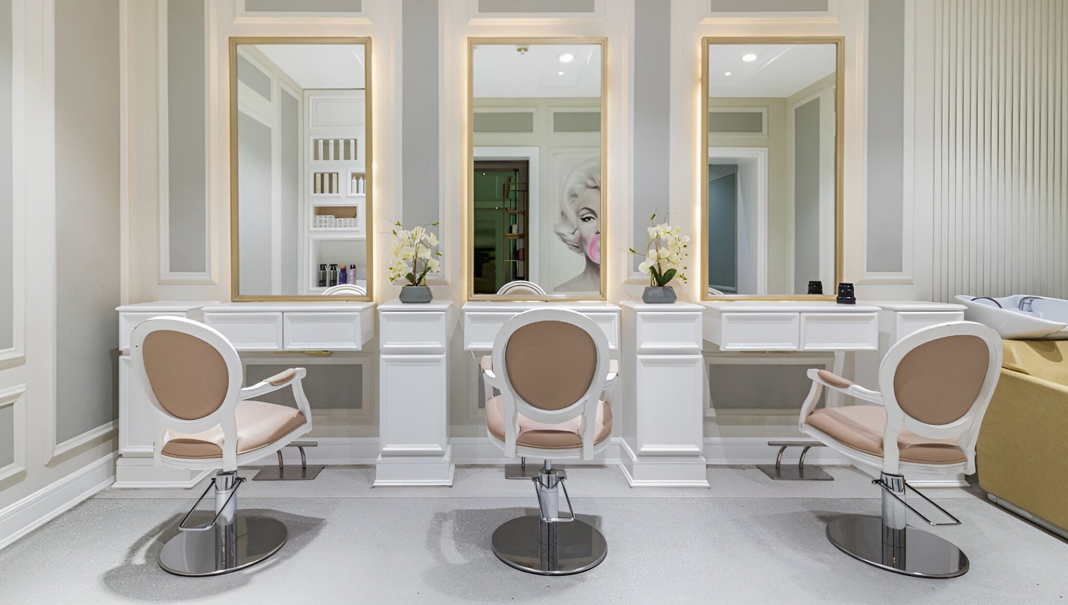 Luxurious interior of Zaki Gents Salon - Anantara in Dubai, Dubai, AE, featuring stylish salon chairs and mirrors.