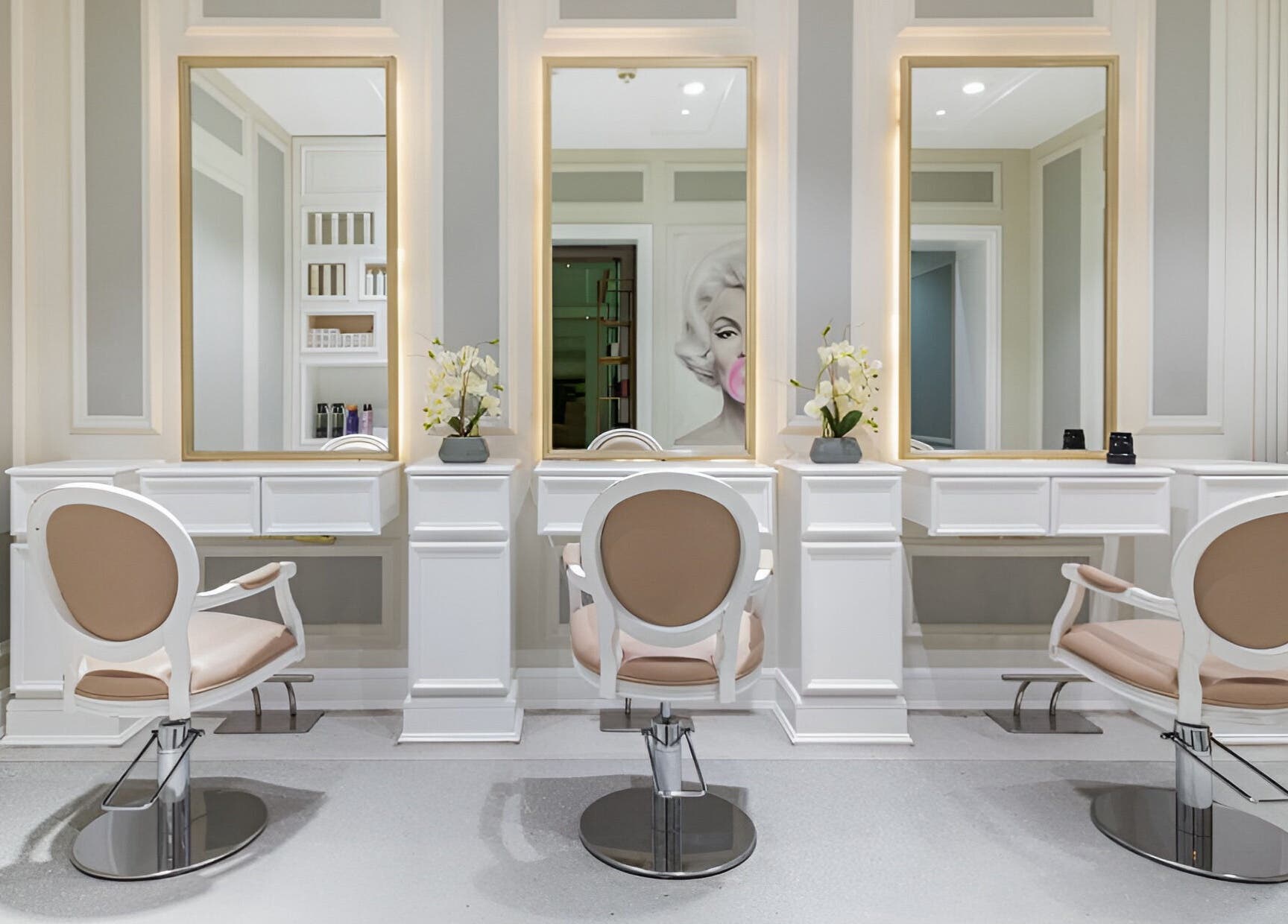 Luxurious interior of Zaki Gents Salon - Anantara in Dubai, Dubai, AE, featuring stylish salon chairs and mirrors.