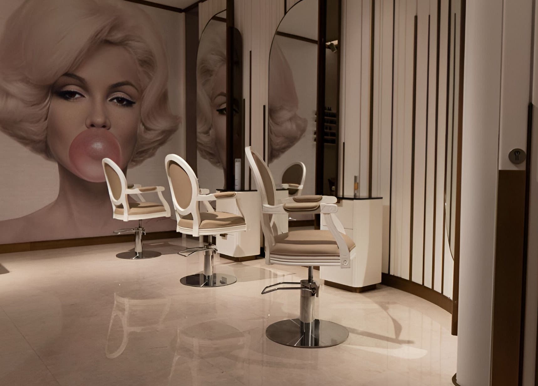 Elegant salon chairs at Zaki Gents Salon - Anantara, Dubai, Dubai, AE with a chic wall mural.