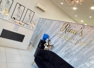 Rina’s laser and beauty clinic front desk in Merrylands West, New South Wales, AU. Elegant decor and modern design.