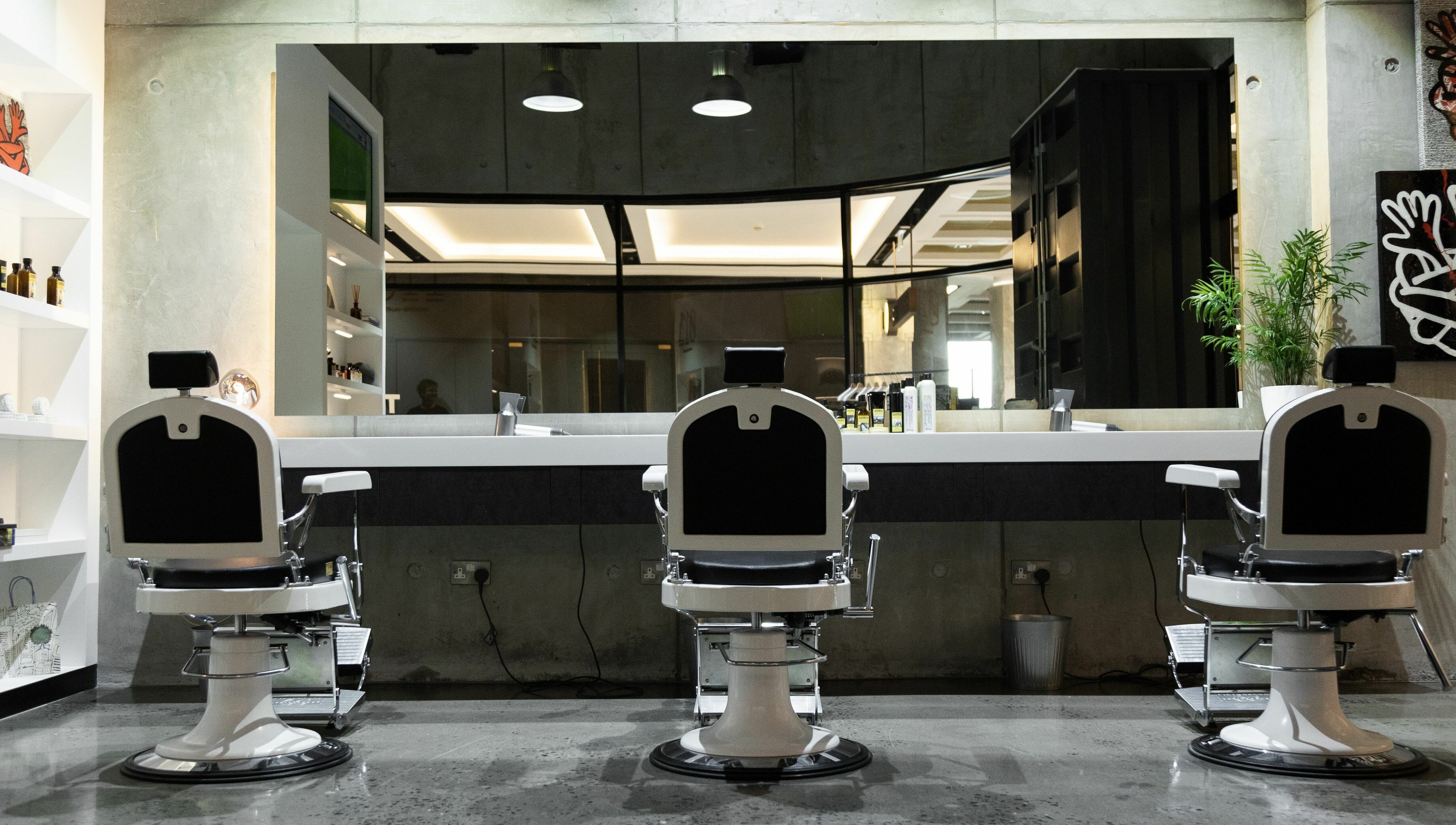 Elegant grooming chairs at 011 Italian Grooming DIFC, Dubai, Dubai, AE, offering premium barber services.