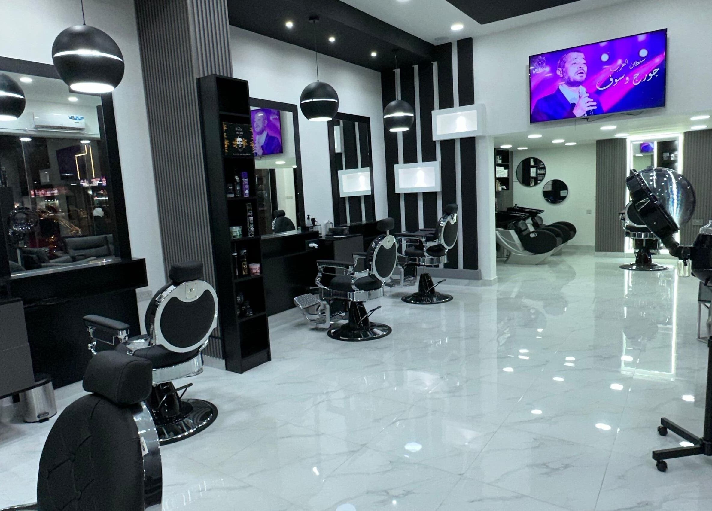 Modern interior of AL AMEER AL MALAKI GENTS SALON in Sharjah offers premium grooming services in a stylish setting.