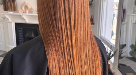 Smooth, glossy copper hair at Vibe Hairdressing, Saint Helier, St Helier, JE. Perfect salon styling.