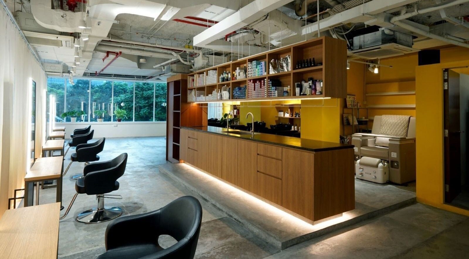 Modern interior of Colors Japanese hair salon in Havelock2, SG with stylish chairs and sleek design.