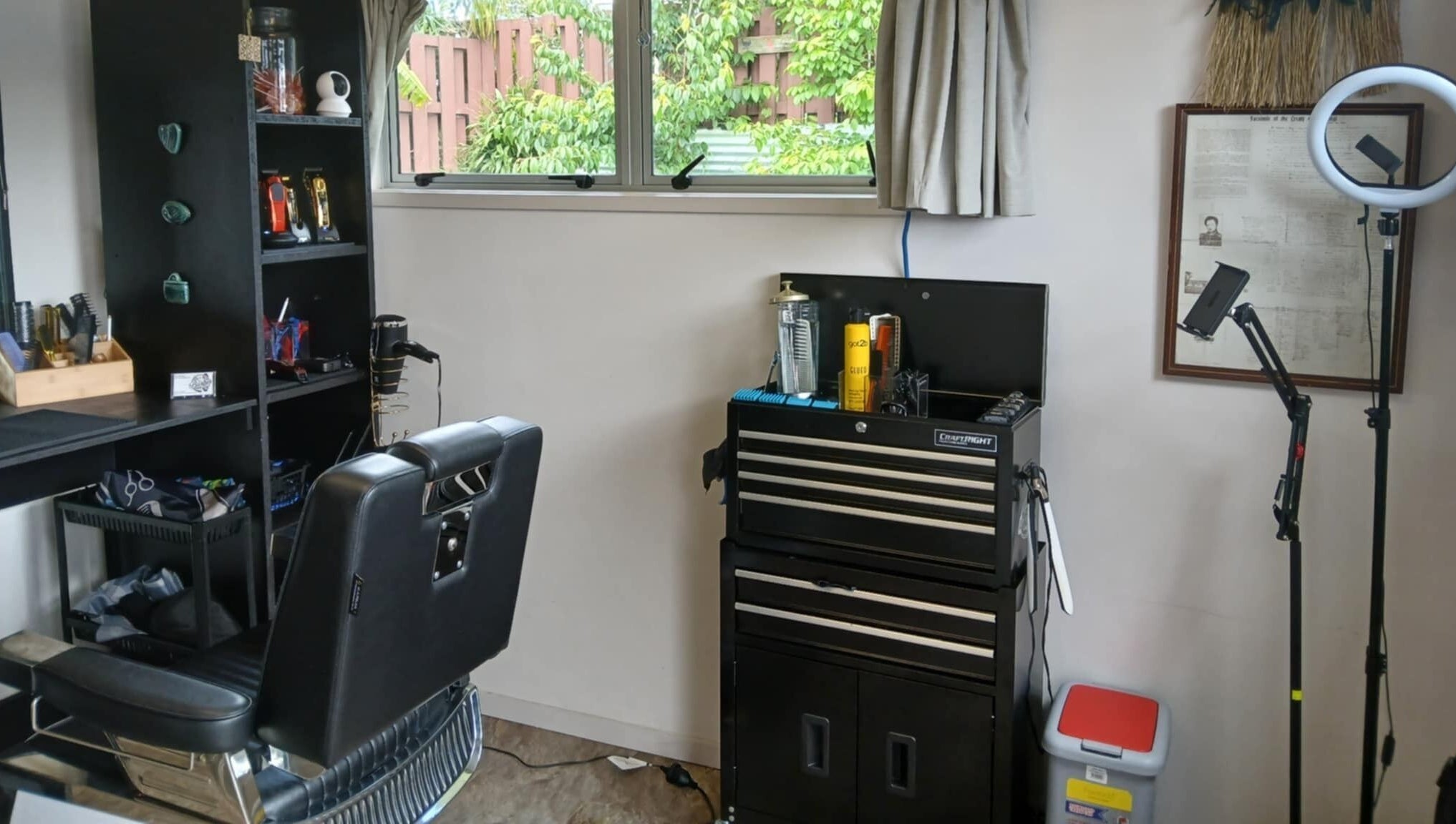 BBI Barbers' stylish interior in Whangārei, Northland, NZ showcases a barber chair and grooming tools.