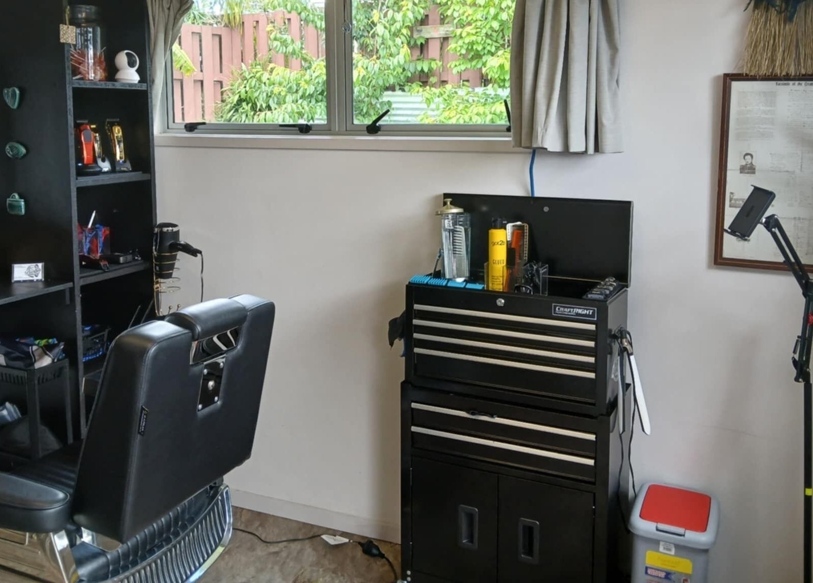 BBI Barbers' stylish interior in Whangārei, Northland, NZ showcases a barber chair and grooming tools.